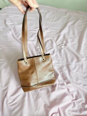 Compact Brown Bucket Shoulder Bag with Mini Flashlight